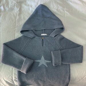 Martin Aranda Hooded Knit Sweater with star design.